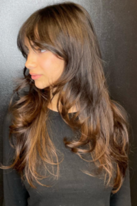 #Long Wavy Wolf Cut with Side-Swept Bangs